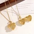 Golden heart locket necklace with angel embossing and shimmering small crystals - Heart Angel Relief Gold Style (XL4888)