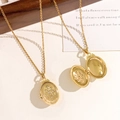 Gold oval locket necklace with etched starburst pattern and small crystal accents - Oval Octagonal Star Gold Style (XL4337)