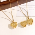 Golden heart locket necklace with star engraving and clear diamond accent - Heart Octagonal Star Gold Style (XL4664)