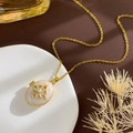 Gold chain necklace with oval pearlescent locket pendant featuring star and pearl details - Cross Star Locket (Gold White)