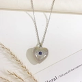 Silver heart-shaped locket necklace featuring a blue evil eye crystal pendant and chain - Heart Eye Style (Silver)