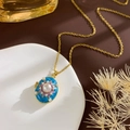 Vintage lichtblauwe emaille medaillon hanger met parels aan een gouden ketting - Ster Medaillon (Goud Blauw)