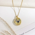 Golden locket necklace with bird relief, blue gemstone and crystal inlay - Eagle Style (Gold)