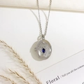 Silver locket necklace with blue stone and pave zircon wings on a minimal background - Eagle Style (Silver With Blue Stone)