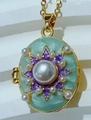 Gouden medaillon ketting met munt-emaille, paarse ster en ingelegde parel hanger - Star Locket (Gold Mint Green)