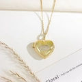 Golden heart locket necklace featuring a sparkling eye motif and a delicate chain - Heart Eye Embossed Style (Gold)