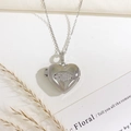 Silver heart locket necklace with sparkling leaf pattern and fine cross chain - Heart Eye Embossed Style (Silver)