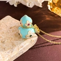 Elegant gold gourd pendant necklace with light blue enamel and small gemstones - Blue Clover Large (XL4530)