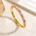 Pink enamel bangle with purple floral patterns and a gold-plated hinged metal frame - Pink Bangle (Gold)