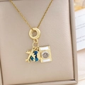 Gold-plated travel set necklace with airplane globe and crystal camera pendant - Gold