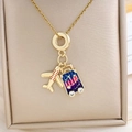 Golden travel necklace featuring airplane and blue pink suitcase charms with rhinestones - Airplane Suitcase Necklace (XL2142) / Gold