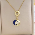 Golden multi-layer necklace with blue starry disc and heart pendant in a beige box - Starry Sky Heart Style (XL2384) / Gold
