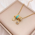 Elegant gold necklace featuring light blue beads and sparkling zircon star pendants - Star Round Combination (XL4425) / Gold