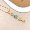 Collier doré avec pierre turquoise bleue et accents de zircon sur chaîne serpent - Or Bleu clair