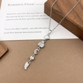 Exquisite silver-tone necklace with celestial pendants featuring zircon and white pearl - XL5074 Shell Moon Tassel Necklace / Silver