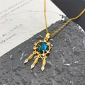 Goldene Traumfänger-Halskette mit blauem Galaxie-Stein und hängenden Federn - Traumfänger Quaste Planet (XL1241) / Gold