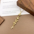 Gold multi-charm necklace with star, butterfly, heart and note micro-set zirconia charms - XL5128 Snowflake Butterfly Tassel Necklace / Gold