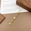 Gold celestial heart pendant necklace with sun and star zircon micro-inlay accents - XL5135 Heart Star Tassel Necklace / Gold