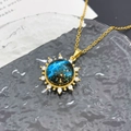 Elegant gold titanium necklace with a deep blue starry galaxy pendant and tiny crystals - Sun Planet (XL225) / Gold