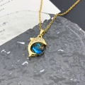 Golden dolphin pendant necklace with blue starry gem and white diamond accents - Dolphin Planet (XL1539) / Gold