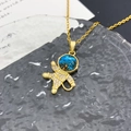 Golden astronaut necklace with blue starry helmet and pavé set white zircon stones - Astronaut Planet (XL1776) / Gold