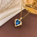 Elegant gold-plated necklace featuring a deep blue heart-shaped crystal pendant - Necklace / Blue - Gold