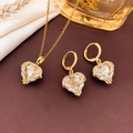 Golden heart-shaped jewelry set with clear crystals and matching earrings on silk fabric - Necklace and Earrings Set / White-Gold