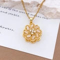 Rotating golden sunflower pendant necklace featuring white marquise gemstone petals - Gold (XL657)