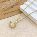Elegant gold chain heart necklace with a large crystal and delicate floral accents - Necklace / Gold / Clear White