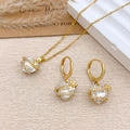 Golden heart jewelry set with sparkling crystals including necklace and hoop earrings - Necklace and Earring Set / Gold / Clear White