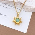 Golden sunburst necklace featuring a central green gemstone and delicate chain detail - Gold Green Cat Eye (XL1869)