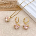 Elegant gold-plated jewelry set with pink heart crystals and ribbon zircon accents - Necklace and Earring Set / Gold / Pink