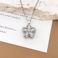Collana con ciondolo a fiore rotante in acciaio al titanio con pietra occhio di gatto - Fiore Rotante a Cinque Petali in Occhio di Gatto (XL2338) / Argento