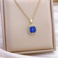 Collier trèfle à quatre feuilles rotatif doré avec pierres bleues et zircons - Pétales bleus (XL5288 Or Petit)