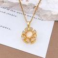 Elegant rotating golden sunflower necklace with white opal and cubic zirconia inlay - Gold (XL3523)