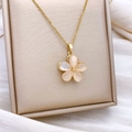 Elegant rotating cat eye stone flower necklace in gold finish on silk background - Rotating Five-petal Flower Style Gold (XL2360)