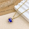 Exquisite gold necklace with a deep blue heart-shaped pendant and white zircon accents - Necklace / Gold / Sapphire Blue