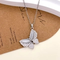 Silver butterfly necklace with cat eye stone and rhinestones on a brown card - Cat's Eye Butterfly Style - Silver (XL4022)