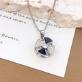 Collana a fiore rotante in argento con smalto nero e accenti in zircone scintillanti - Fiore Rotante a Quattro Petali (XL3762) / Argento