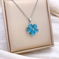 Rotating blue cat eye stone flower pendant necklace with elegant silver-tone chain - Rotating Blue Five-petal Flower Silver (XL2360)