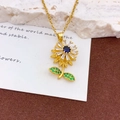 Drehbare Sonnenblumen-Halskette in Gold mit blauem Kristall und Zirkonia-Blüten - Gold Blau Stil (XL675)