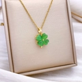 Golden necklace featuring a green cat eye stone clover pendant on a thin link chain - Rotating Clover Style Gold Green (XL2471)