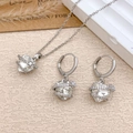 Elegant silver heart necklace and earring jewelry set featuring heart-cut crystal stones - Necklace and Earring Set / Silver / Clear White