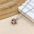 Rainbow heart pendant necklace with silver floral accents and crystal zircons - Necklace / Silver / Iridescent