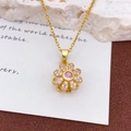 Goldene drehbare Sonnenblumen-Kette mit rosa Kristallherz und funkelnden Blüten - Rotierende Rosa Vielblättrige Blume Halskette Gold (XL221)