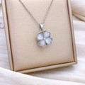 Elegant rotating clover necklace with silver chain and white cat eye stone petals - Rotating Clover Style Silver (XL2519)