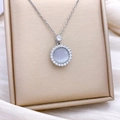 Silver-toned flower necklace with rotating grey cat-eye stone and zircon halo - Rotating Round Style Silver Large (XL2541)