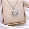 Silver-toned spinning flower necklace with a round opal pendant and sparkling crystals - Rotating Three-petal Flower Silver (XL2924)