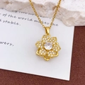 Drehbare goldene Sonnenblumen-Halskette mit funkelnden Zirkonia-Blüten auf Kreuzkette - Rotierende Sechsblättrige Blume Halskette Gold (XL1345)