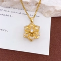 Drehbare Sonnenblumen-Halskette mit Zirkonia-Besatz und vergoldeter Kupferkette - Rotierende镂空Sechsblättrige Blume Halskette Gold (XL1348)